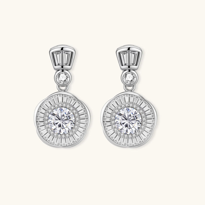 Art Deco-inspired sterling silver drop earrings with tiered moissanite stones in geometric sunburst design