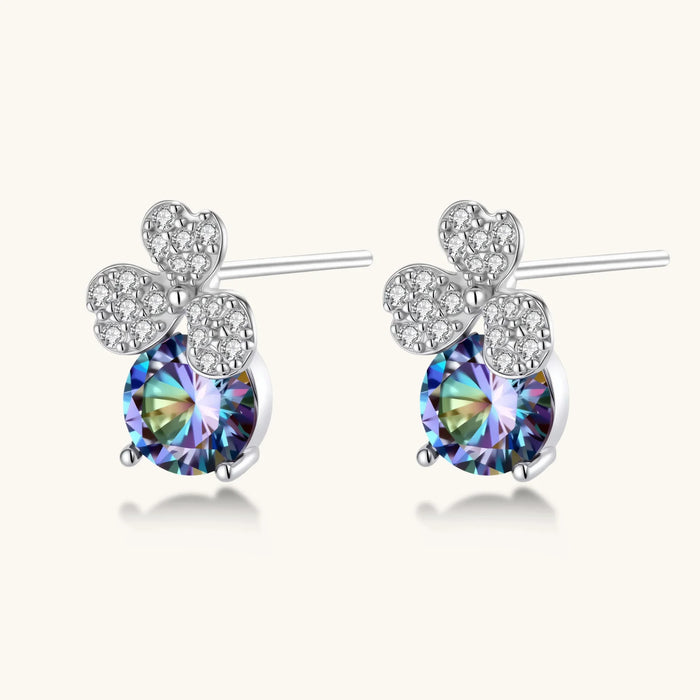 Sterling silver stud earrings with four-leaf clover design featuring small crystals above round moissanite stones