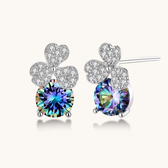 Sterling silver stud earrings with four-leaf clover design featuring small crystals above round moissanite stones