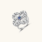 Prismatic Bloom Moissanite Ring